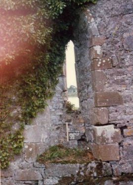 Photo 3: Window on the South wall of Tomfinlough Church. Inside shot